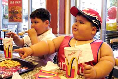 Four-year-old Russian boys enjoy another Big Mac Photograph: Shakh Aivazov/AP Photo